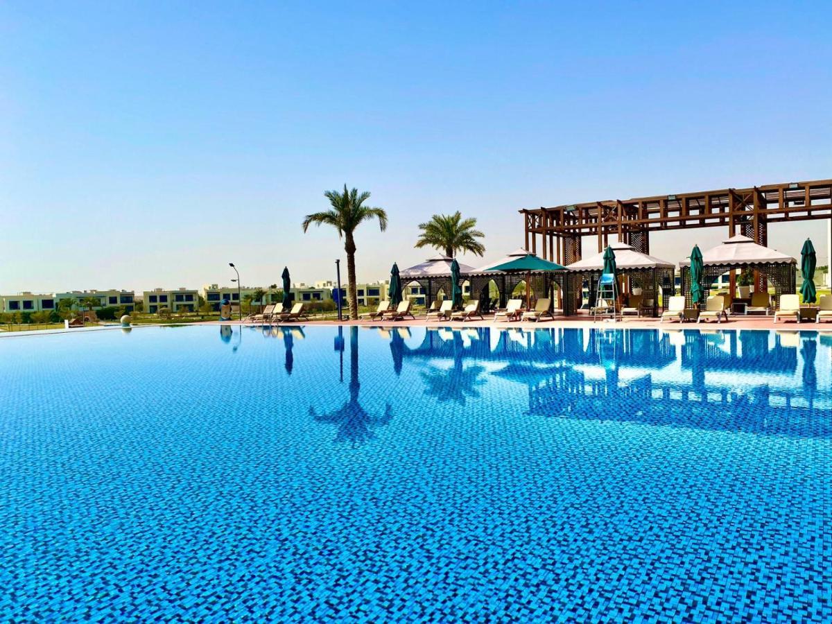 เรทาจ ซัลวา รีสอร์ต แอนด์ สปา Hotel โดฮา ภายนอก รูปภาพ The swimming pool at the clubhouse