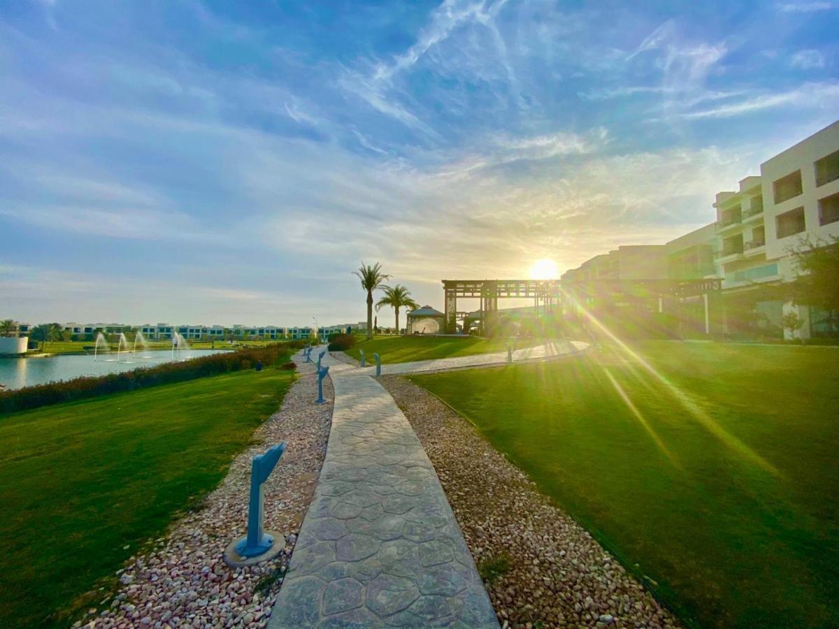 เรทาจ ซัลวา รีสอร์ต แอนด์ สปา Hotel โดฮา ภายนอก รูปภาพ Sunrise at the Al-Shaqra residential complex