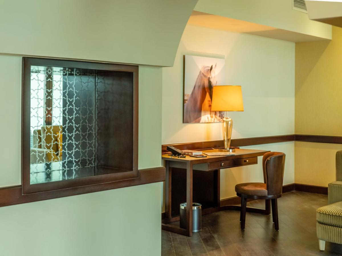 เรทาจ ซัลวา รีสอร์ต แอนด์ สปา Hotel โดฮา ภายนอก รูปภาพ A room at the Inn at the Opera