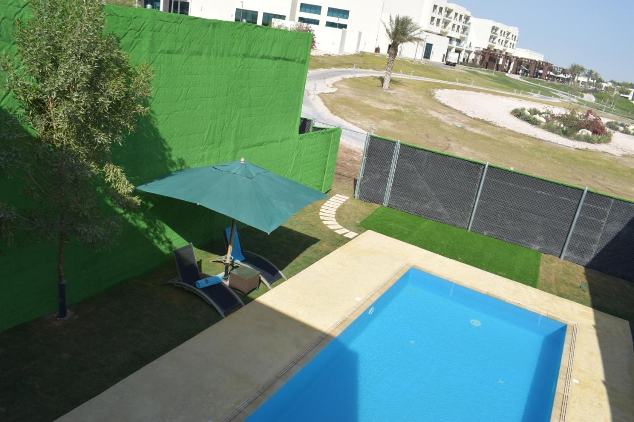 เรทาจ ซัลวา รีสอร์ต แอนด์ สปา Hotel โดฮา ภายนอก รูปภาพ Swimming pool at the University of Batna