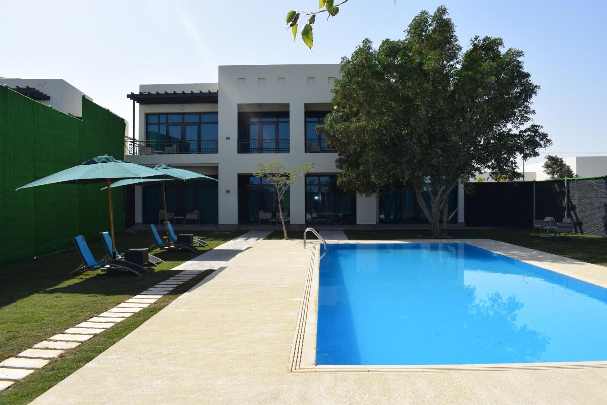 เรทาจ ซัลวา รีสอร์ต แอนด์ สปา Hotel โดฮา ภายนอก รูปภาพ A villa in Al Reef