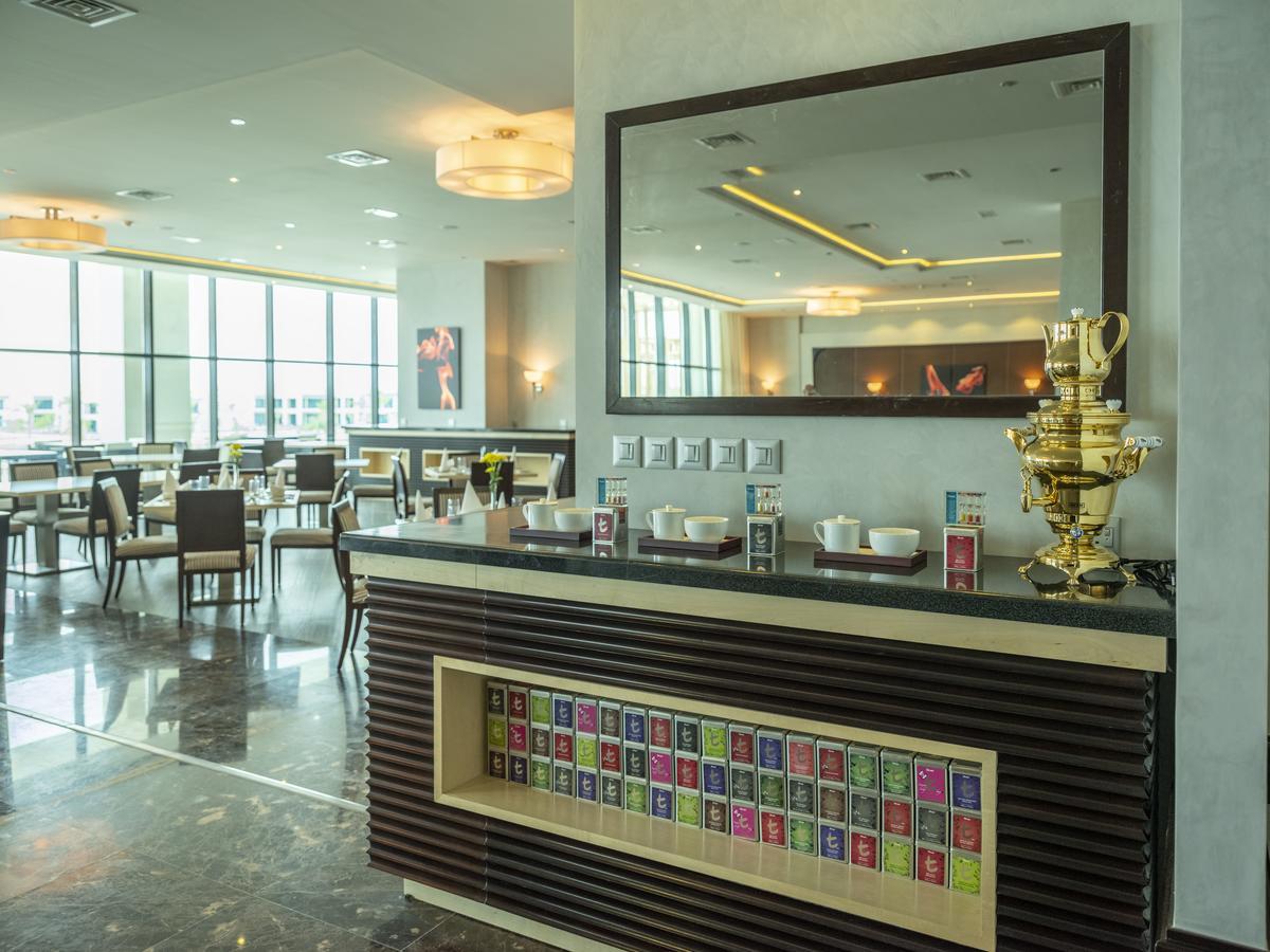 เรทาจ ซัลวา รีสอร์ต แอนด์ สปา Hotel โดฮา ภายนอก รูปภาพ The lounge at the airport