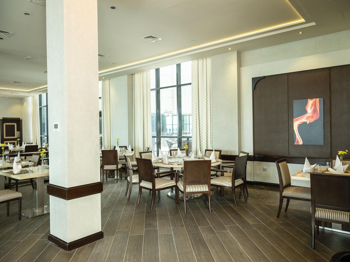 เรทาจ ซัลวา รีสอร์ต แอนด์ สปา Hotel โดฮา ภายนอก รูปภาพ The restaurant