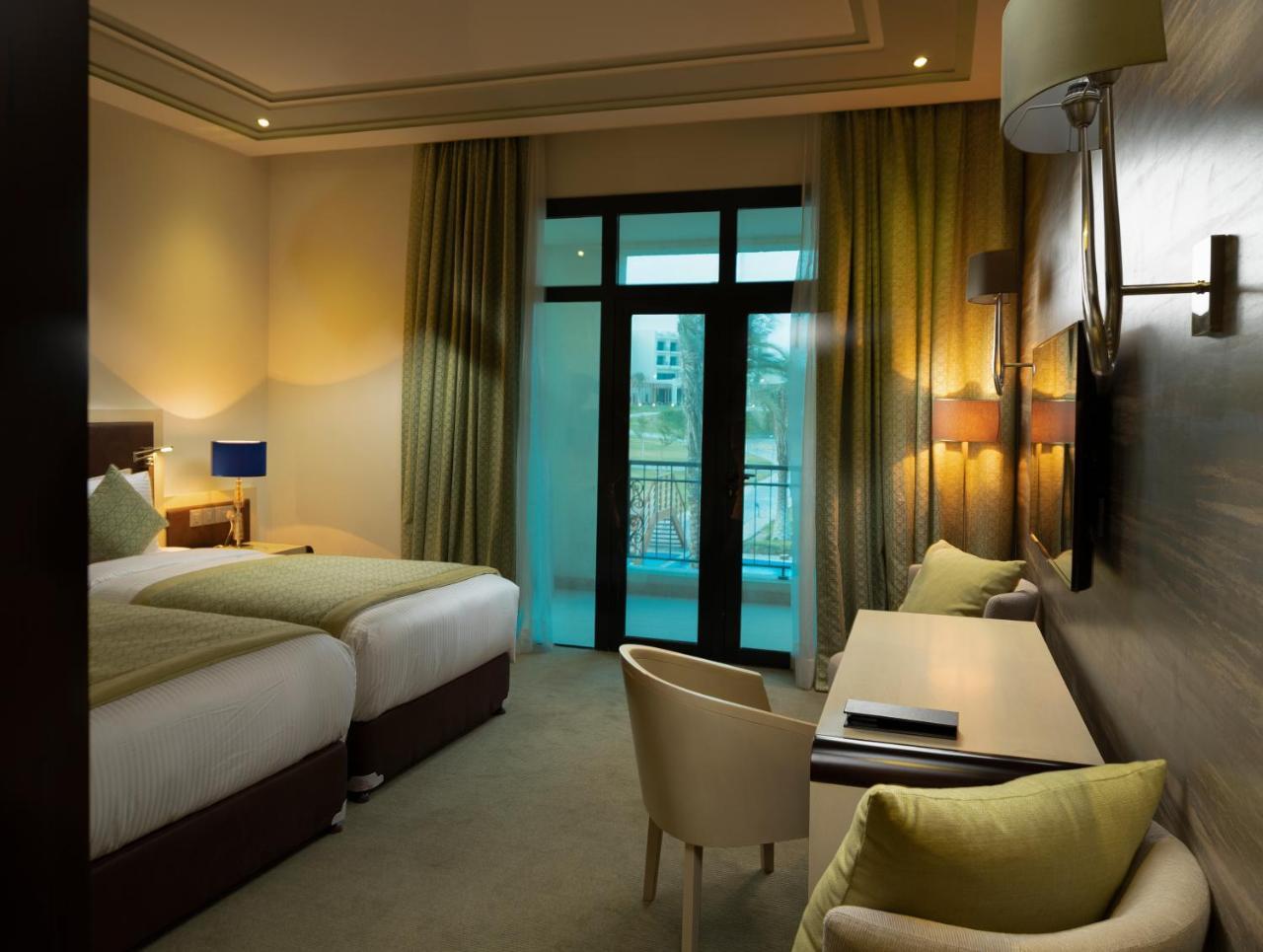 เรทาจ ซัลวา รีสอร์ต แอนด์ สปา Hotel โดฮา ภายนอก รูปภาพ A room at the hotel