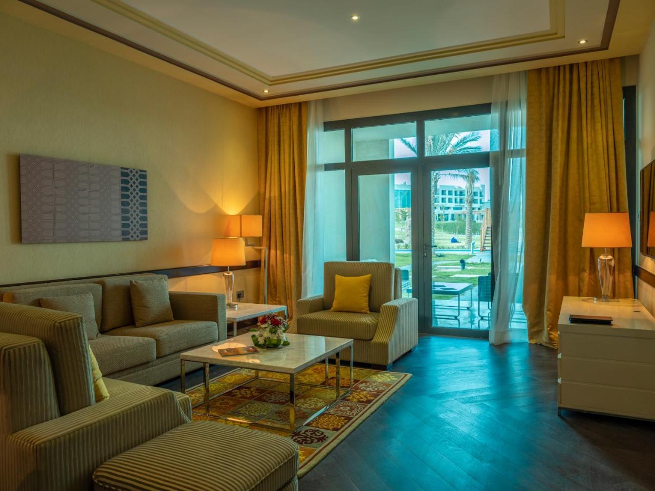 เรทาจ ซัลวา รีสอร์ต แอนด์ สปา Hotel Al Rayyan ภายนอก รูปภาพ A living room at the hotel