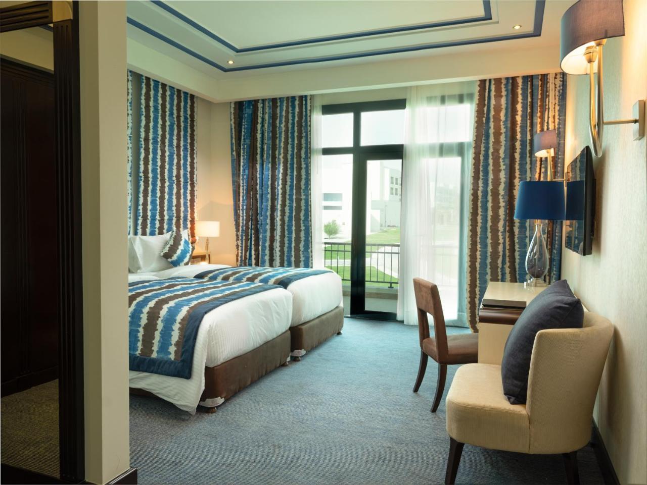 เรทาจ ซัลวา รีสอร์ต แอนด์ สปา Hotel Al Rayyan ภายนอก รูปภาพ A room at the hotel