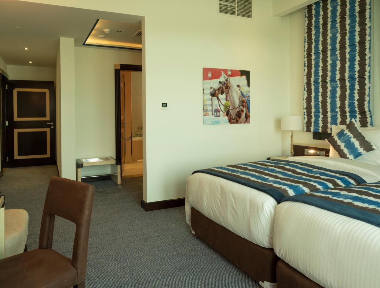 เรทาจ ซัลวา รีสอร์ต แอนด์ สปา Hotel โดฮา ภายนอก รูปภาพ A room at the hotel