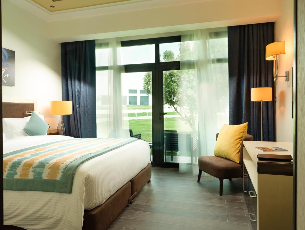 เรทาจ ซัลวา รีสอร์ต แอนด์ สปา Hotel โดฮา ภายนอก รูปภาพ A room at the hotel