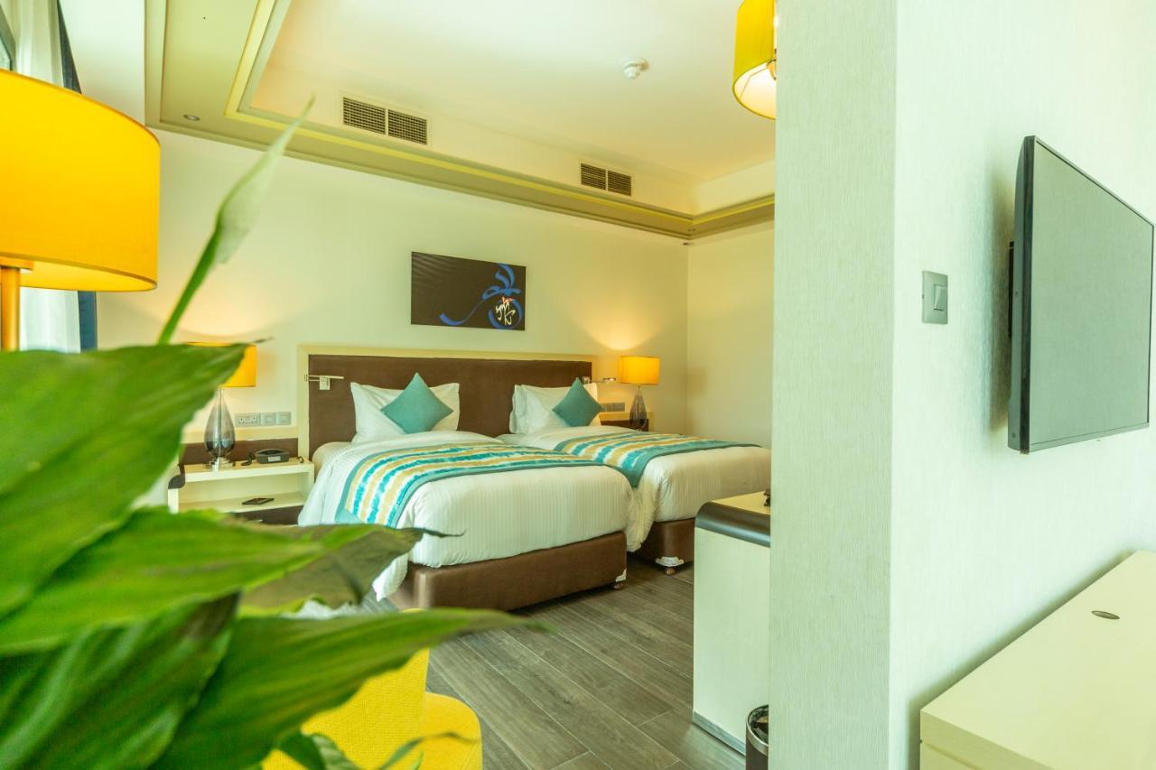 เรทาจ ซัลวา รีสอร์ต แอนด์ สปา Hotel โดฮา ภายนอก รูปภาพ Deluxe Room